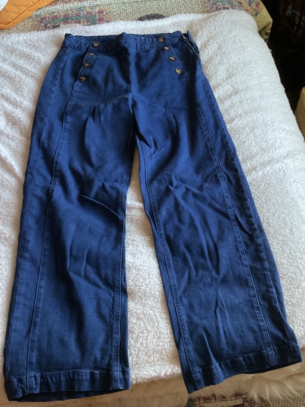 Dark blue button side jeans